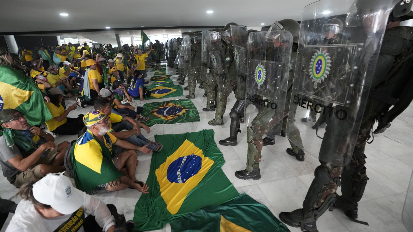 Pro-Bolsonaro rioters on trial for storming Brazil's top government offices – The Associated Press